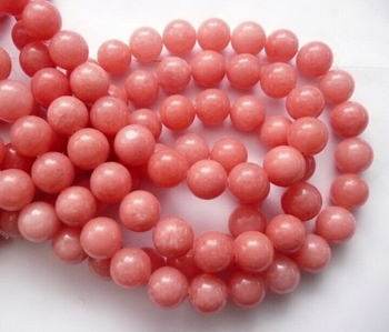 dyed Rhodochrosite orange pink ound 10mm AAA