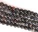 Black Fire Agate round faceted 08mm AAA