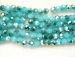 e blue Y Crystal opaque faceted round 06mm AAA T